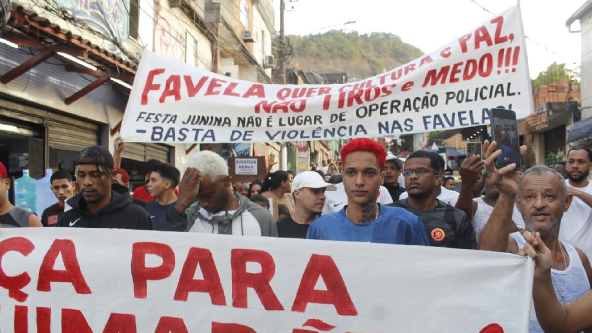 rj:-oruam-e-moradores-protestam-apos-morte-de-jovem-baleado-em-festa-junina