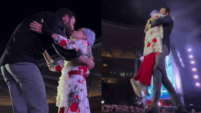 gusttavo-lima-carrega-no-colo-e-beija-fa-idosa-em-show;-veja-o-momento