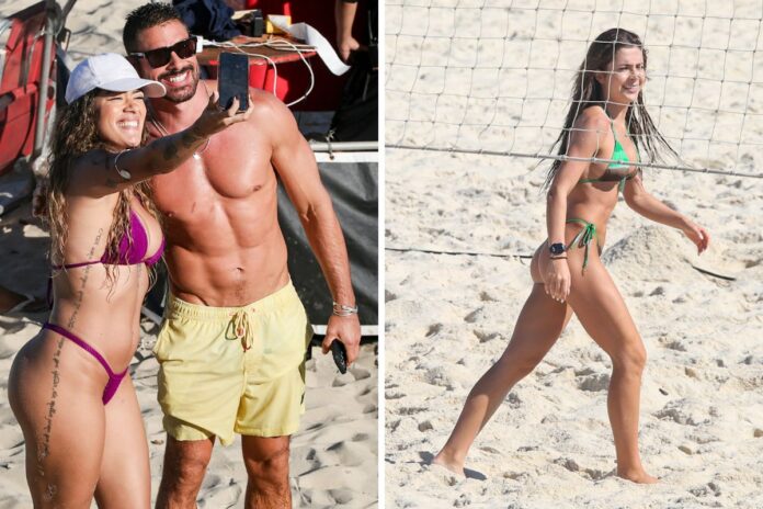 caua-reymond-posa-com-fa-enquanto-jade-picon-joga-futevolei-na-areia